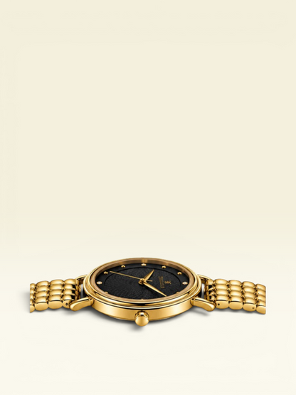 Labdhi Watches & Premium Time Gold Celestia Royale watch with a black guilloché dial and gold-tone bracelet.