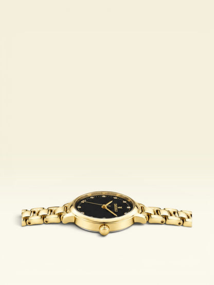 Labdhi Watches & Premium TimeGold Aurelia Grace watch with a black sunray dial, gold-tone bracelet, and crystal markers.