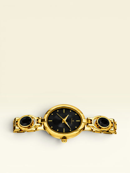 Labdhi Watches & Premium TimeGold TG-13-04 gold-tone women's watch with a black dial and oval black stone accents.