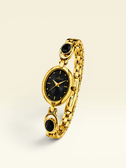Labdhi Watches & Premium TimeGold women's watch with a black dial, gold oval case, and decorative black stone links.