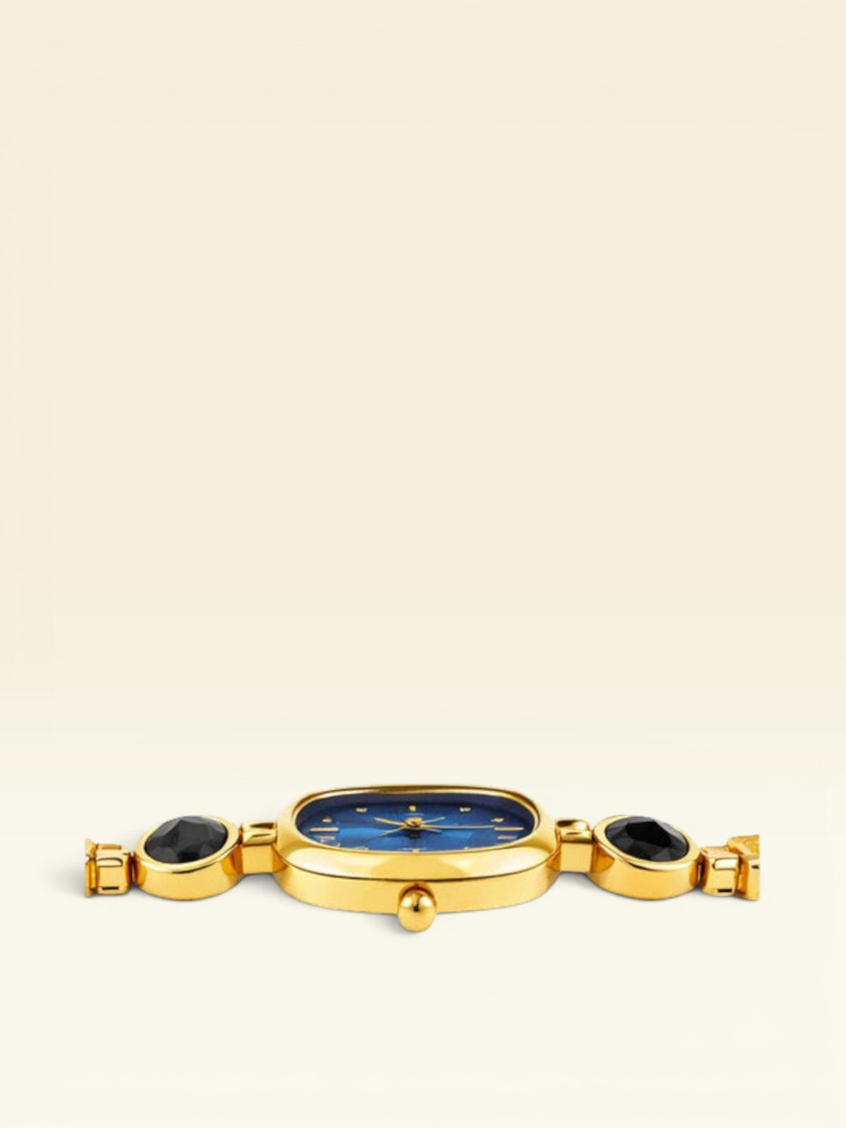 Labdhi Watches & Premium TimeGold watch with a blue dial, gold-tone case, and black stone accents on the bracelet.
