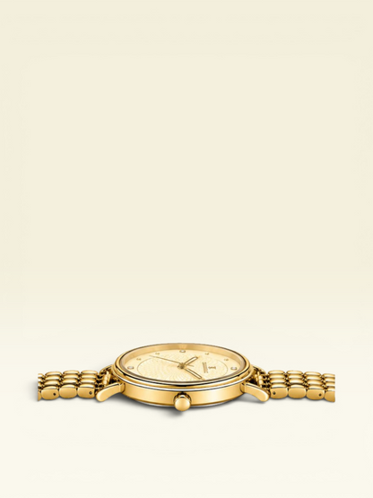 Labdhi Watches & Premium Time Gold Celestia Royale watch with a gold-tone bracelet and champagne guilloché dial.