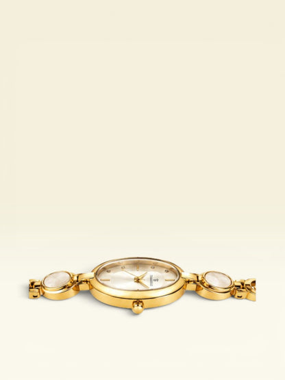 Labdhi Watches & Premium TimeGold women's gold-tone watch with oval accents and a minimalist dial, side view.