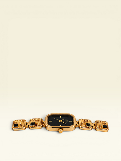 Labdhi Watches & Premium Time Gold square watch with a black dial and gold-tone textured link bracelet.