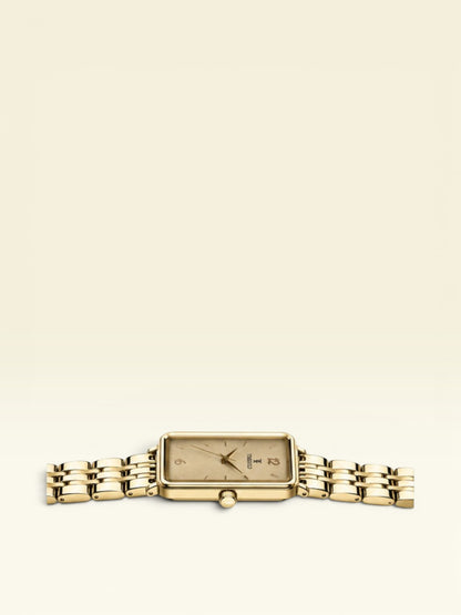 Labdhi Watches & Premium Time Gold square watch with a champagne gold dial and polished gold-tone metal bracelet.