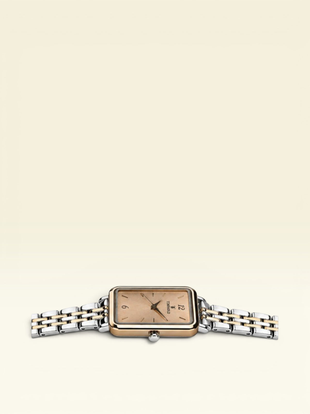 Labdhi Watches & Premium Time Gold square watch with a champagne dial and two-tone silver and gold metal bracelet.