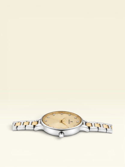 Labdhi Watches & Premium Time Gold Aurelia Grace watch with a gold sunray dial, crystal markers, and two-tone bracelet.