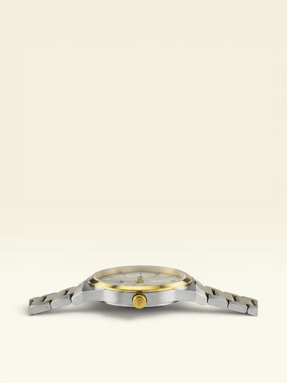 Labdhi Watches & Premium TimeGold TG-15-03 watch showing a slim profile, gold bezel, and two-tone steel bracelet.